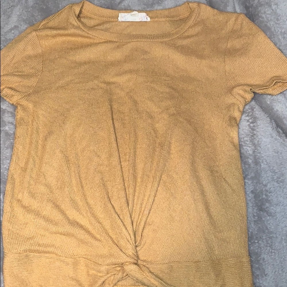 twisted front of yellow shirt